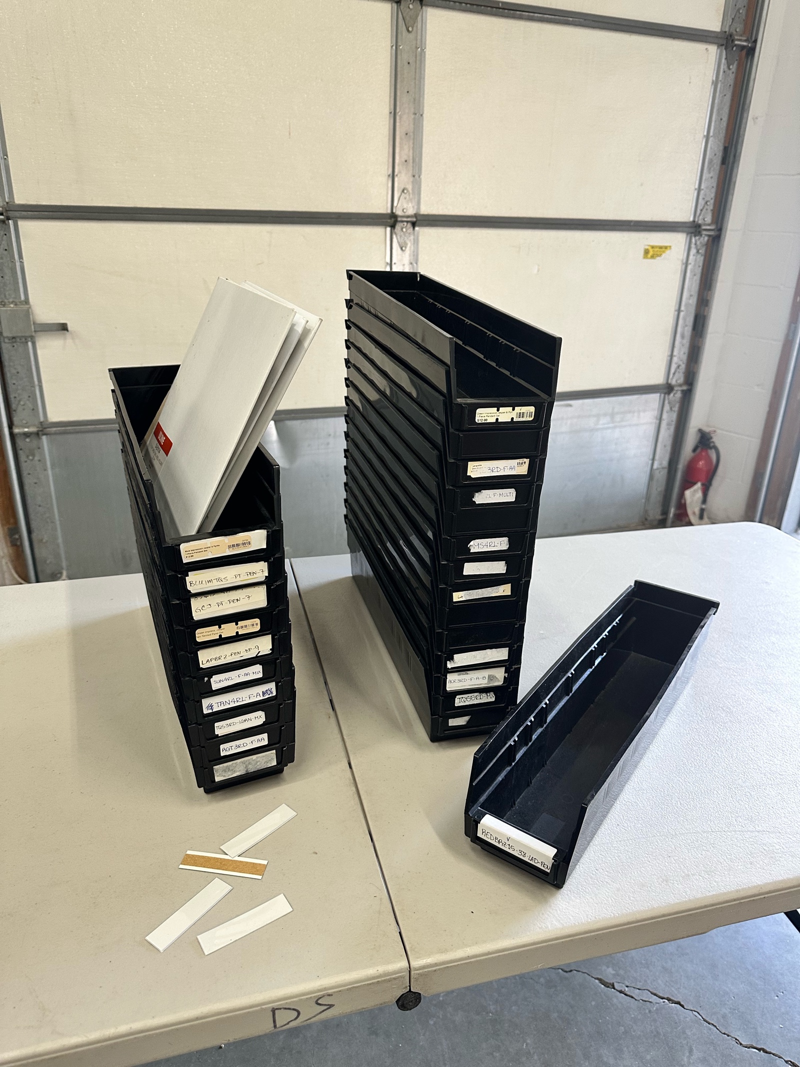 Uline 4x4x18 black plastic bins (lot 25)