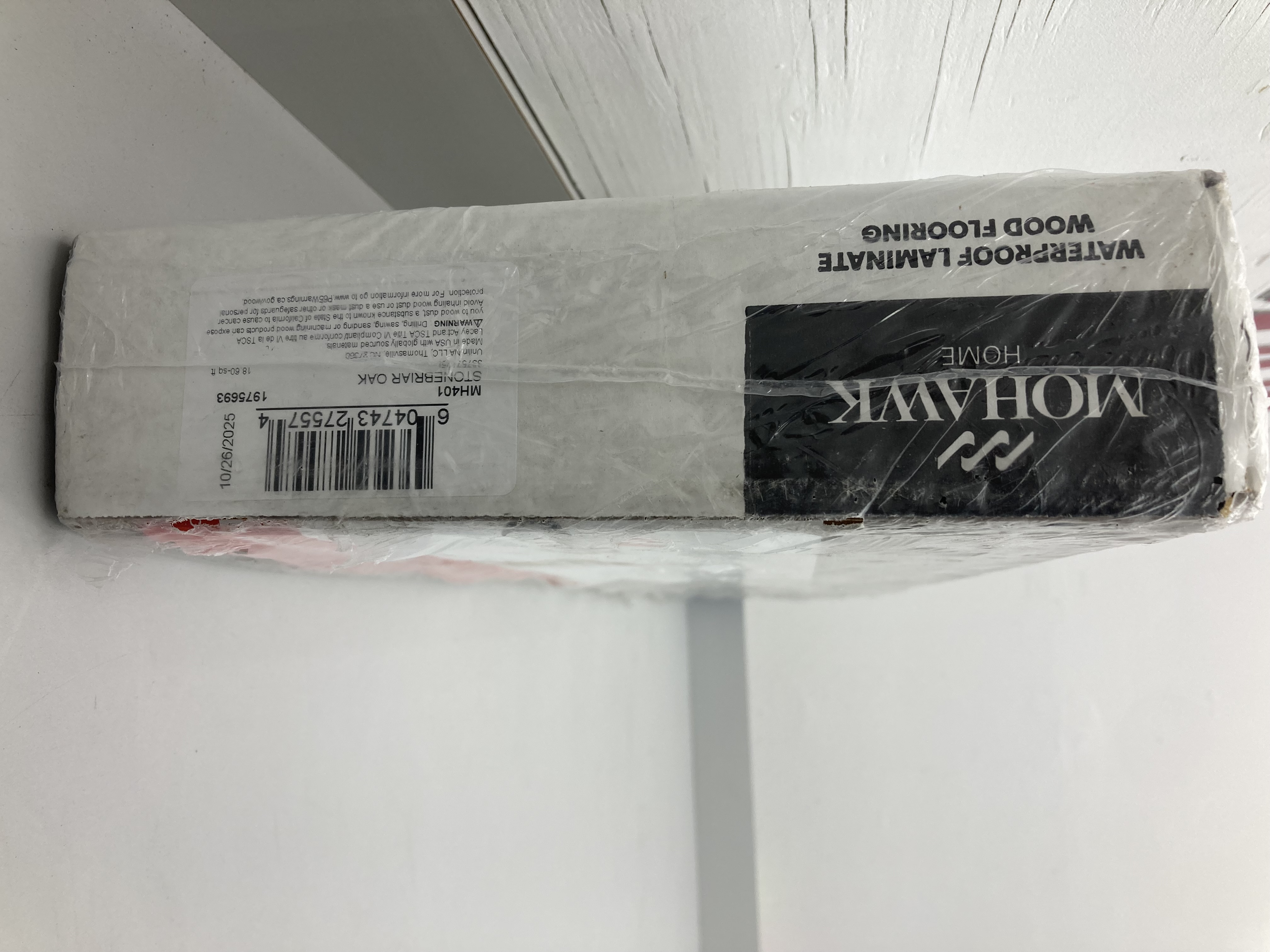 lot 23 image: Mohawk Home Waterproof Laminate Wood Flooring - Stonebriar Oak (3 boxes)