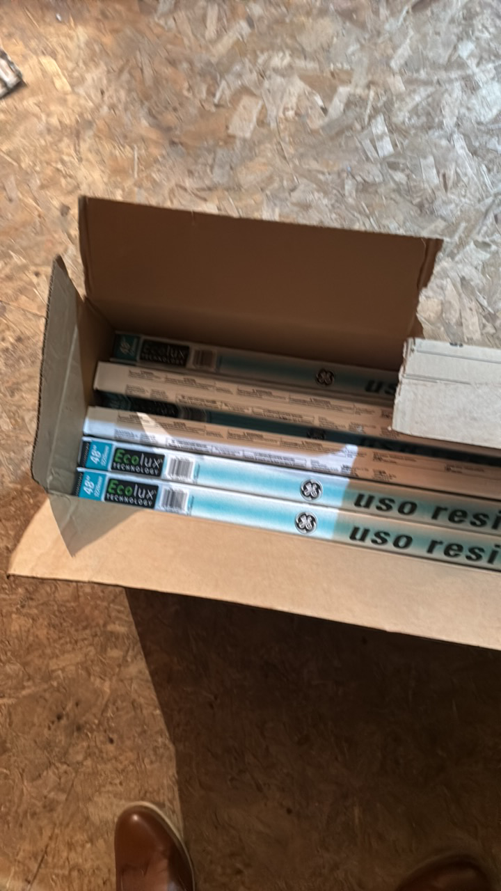 lot 118 image: Open Case of General Electric Fluorescent Bulbs, 16 Bulbs in Box, F40T12, 3150 Lumens, 40 Watts, 48 Inches Long, 4,100 Kelvin Light Temperature, 72 CRI