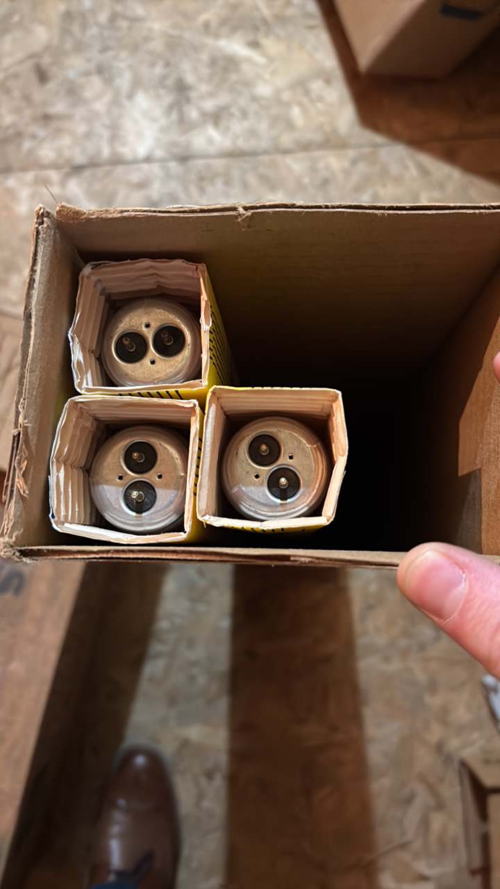 lot 143 image: Open Case of General Electric Light Bulbs, 3 Bulbs, Appliance Cool White, F25-T12-CW-28, 25 Watts 28 inches long