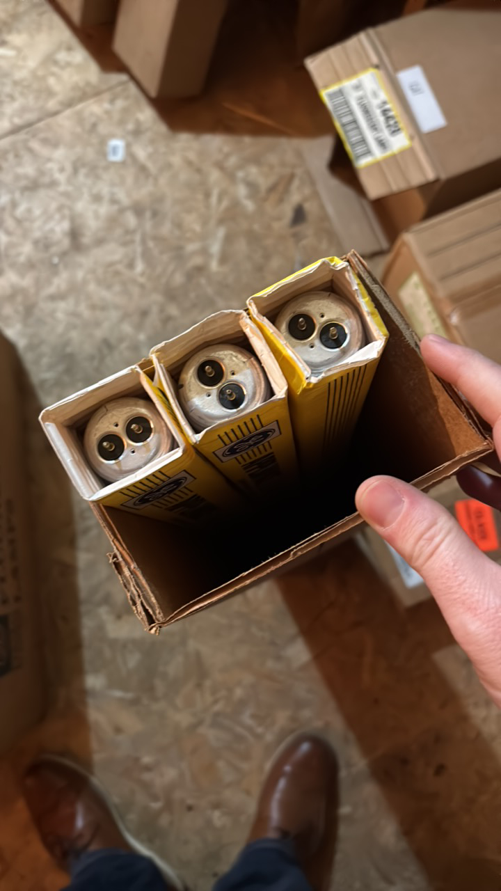 lot 144 image: Open Case of General Electric Light Bulbs, 3 Bulbs, Appliance Cool White, F25-T12-CW-33, 25 Watts 33 inches long