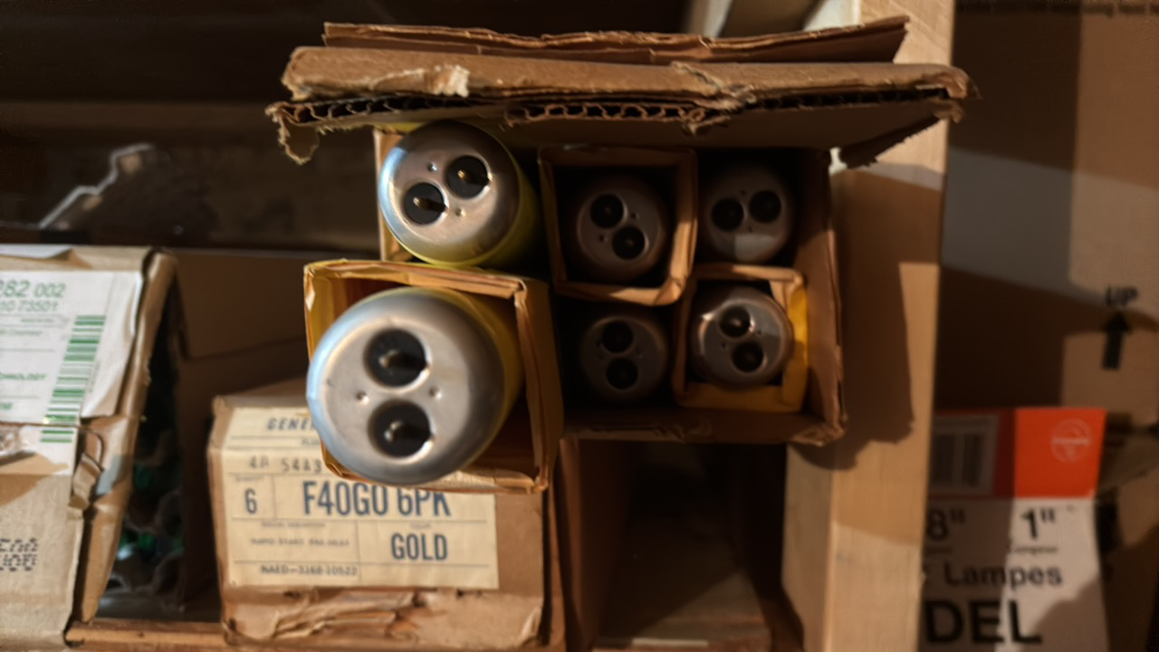 lot 149 image: Full Case of General Electric Fluorescent Light Bulbs, 6 Bulbs in Box F40GO , 40 Watts, Gold Color Light, 48 Inches Long