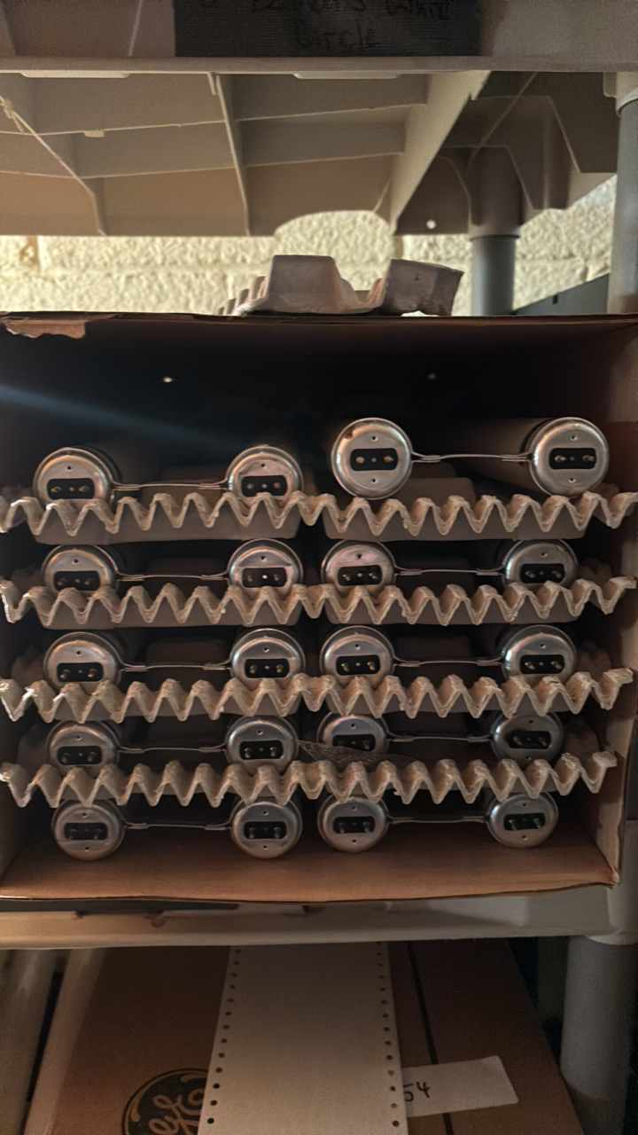 lot 155 image: Open Case of Philips Fluorescenf Light Bulbs, 10 U-Shaped Bulbs in Box, F834-CW-3-EW Econ-O-Watt 34 Watts