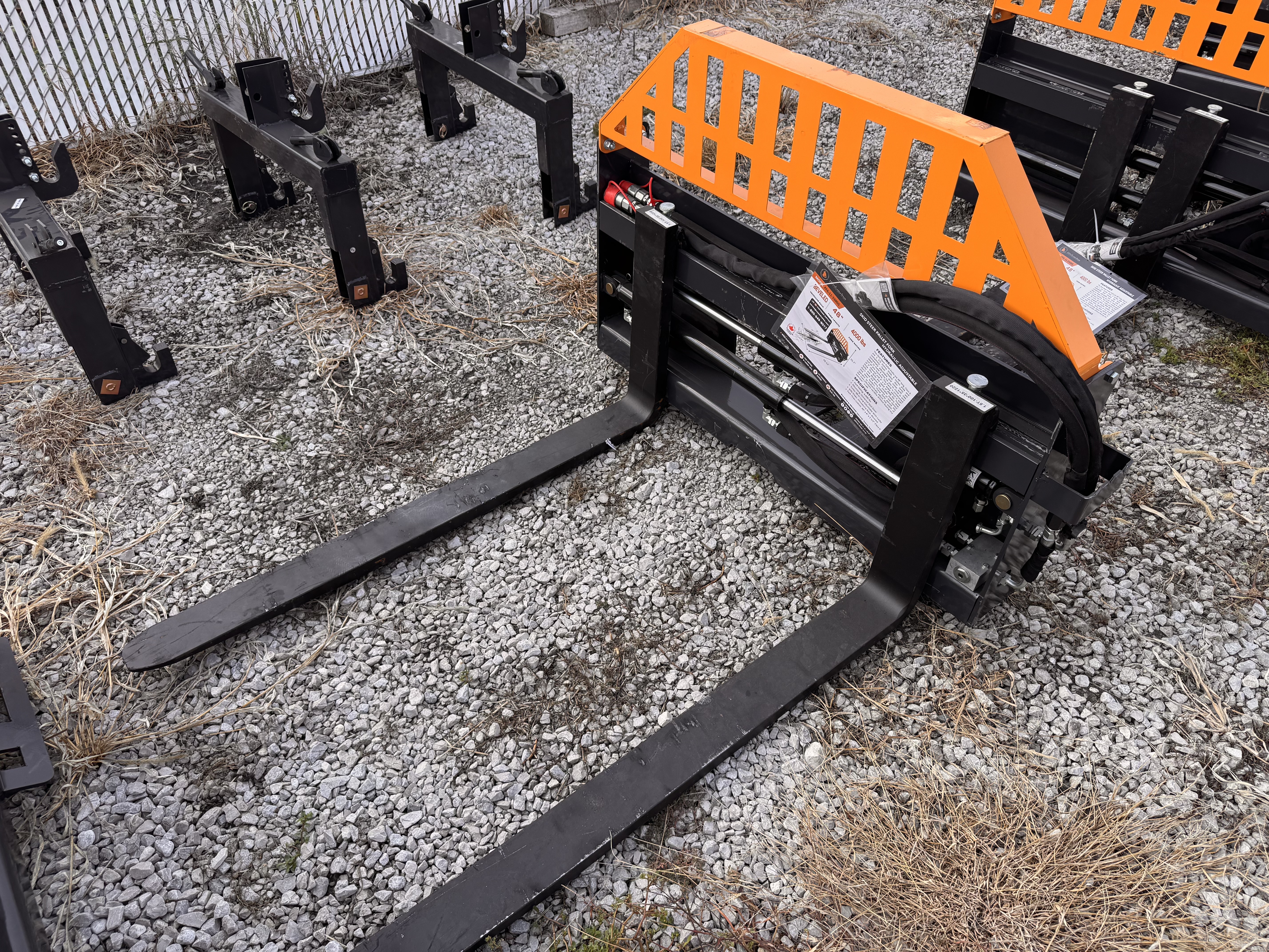 lot 48 image: Wolverine 48 Skid Steer Hydraulic Adjustable Pallet Forks