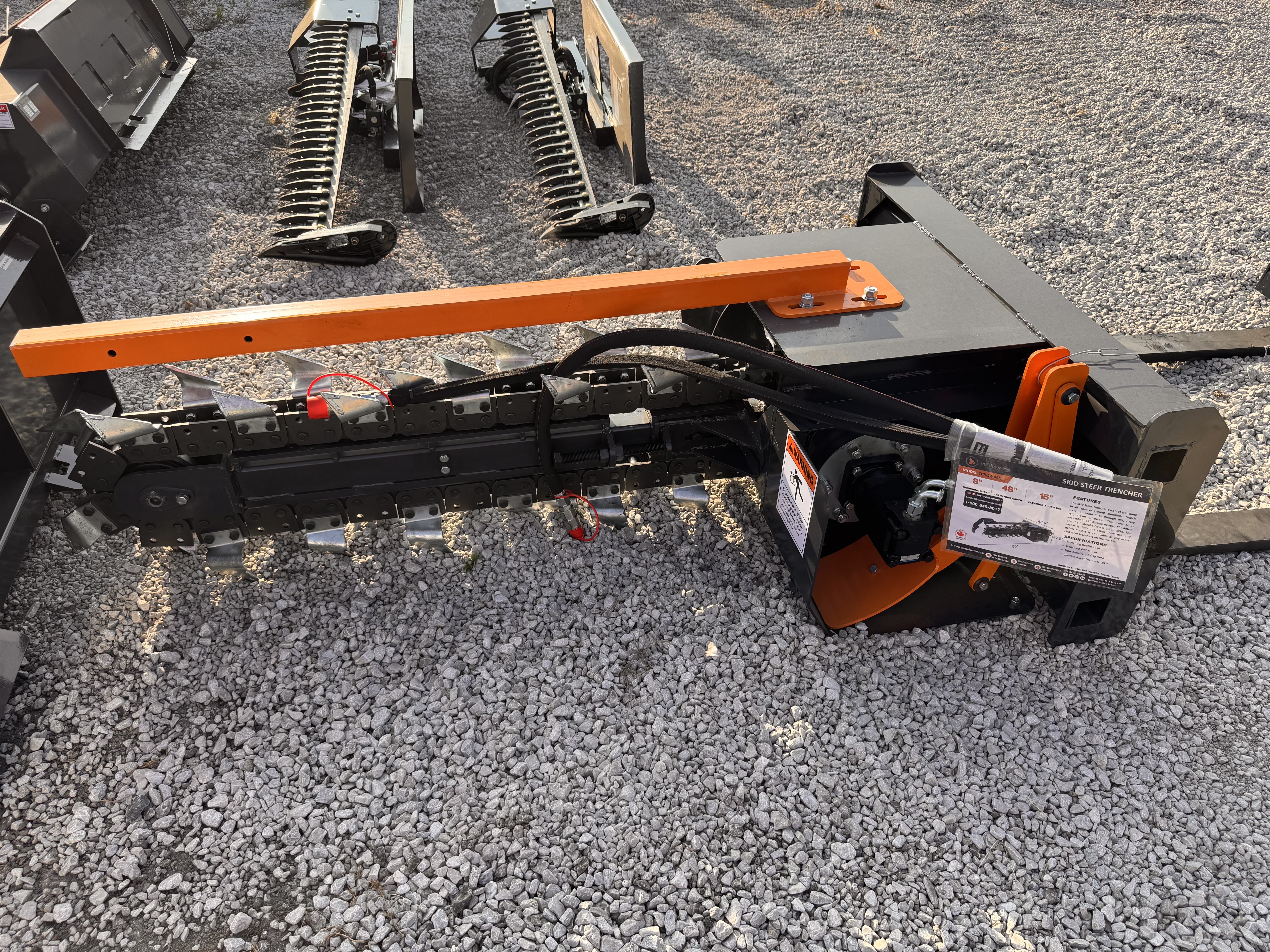 lot 55 image: Wolverine 48 Skid Steer Trencher