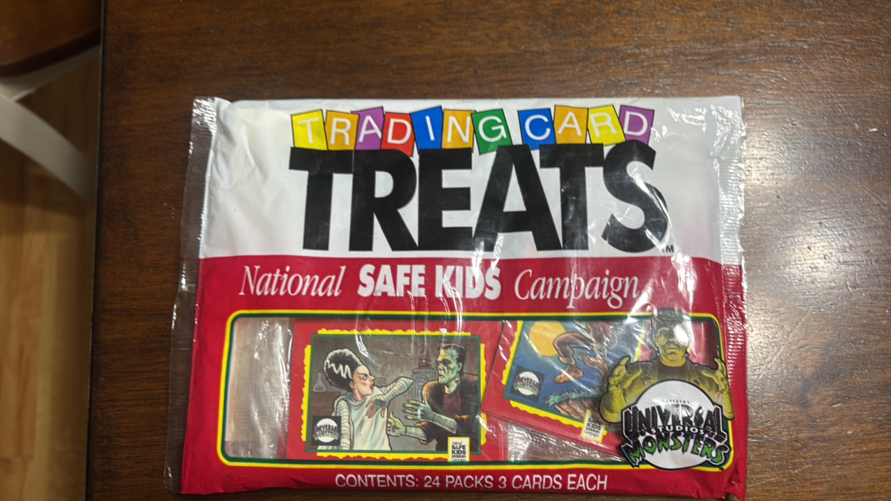 lot 302 image: Trading Card Treats Sealed Bag of 24 Packs of Cards Featuring Universal Studios Monsters, RARE SEALED