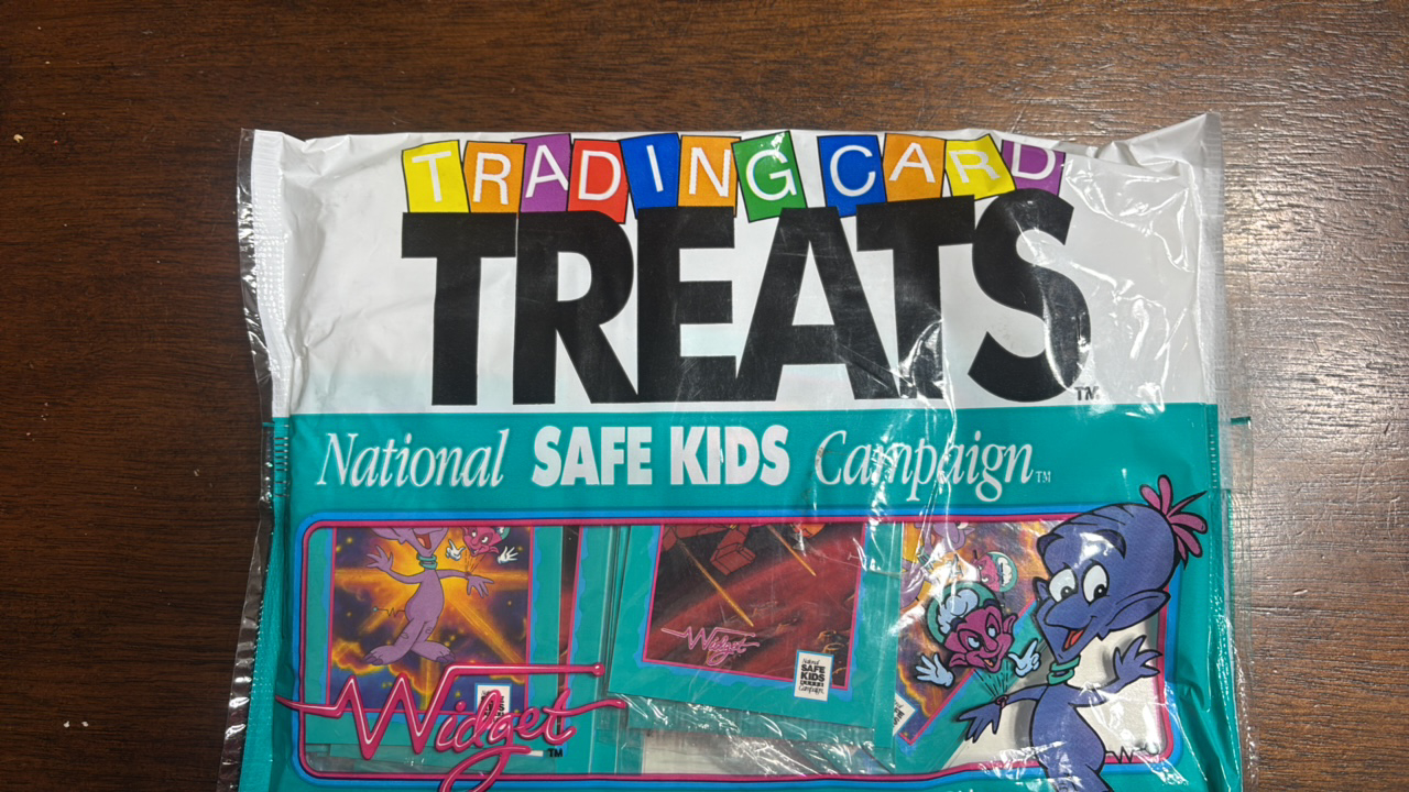 lot 304 image: Trading Card Treats Sealed Bag of 24 Packs of Cards Featuring Widget Characters, RARE SEALED