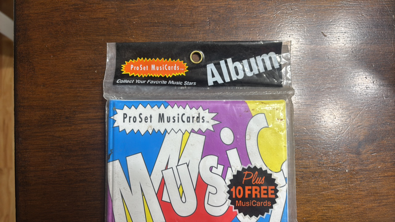 lot 307 image: Pro Set Music Cards Album and 10 Music Cards, Sealed 1991