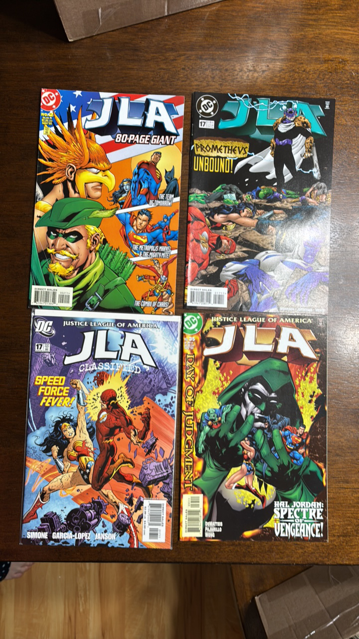 lot 327 image: Justice League of America Comic Book Lot 4 Comics from DC