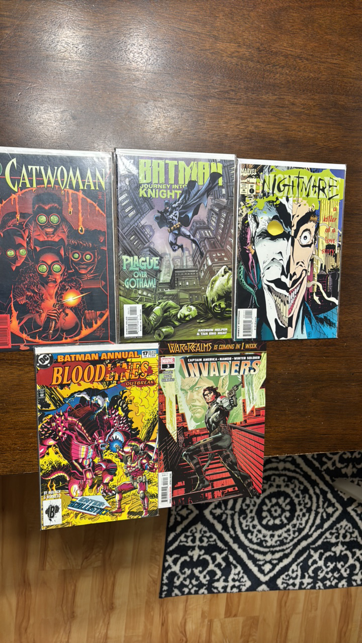 lot 370 image: Batman, Catwoman, and Captain America Winter Soldier Collection of 5 Comics