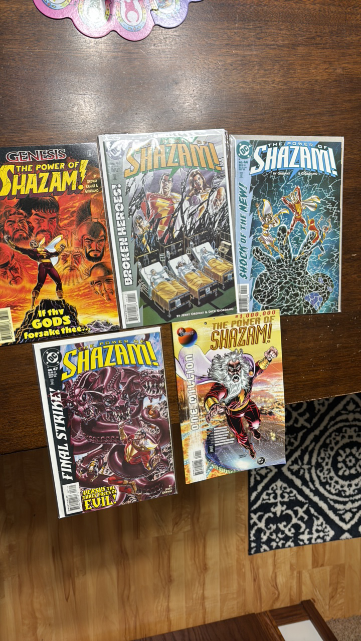 lot 396 image: The Power of Shazam Comic Book Lot DC, #s 31,43,44,47 and One Millopn Special Edition