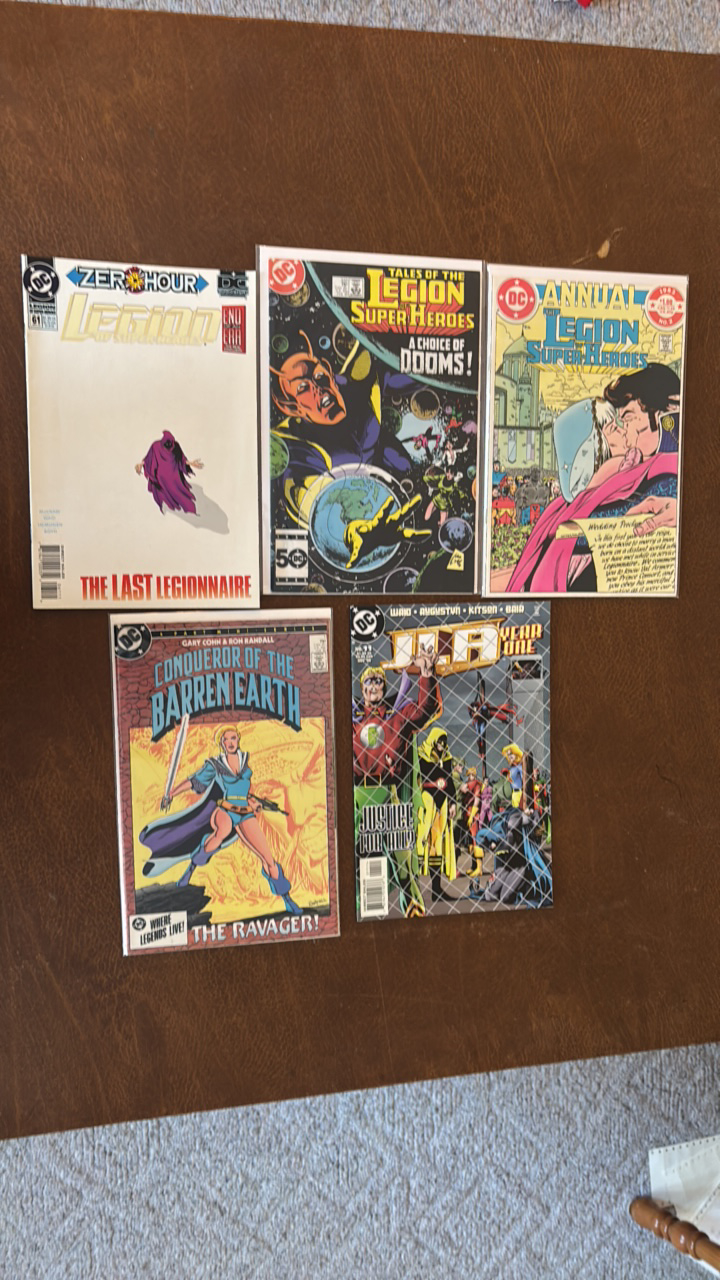 lot 413 image: Legion of Super Heroes and Justice League and Conquerer of the Barren Earth DC Comic Books Lot
