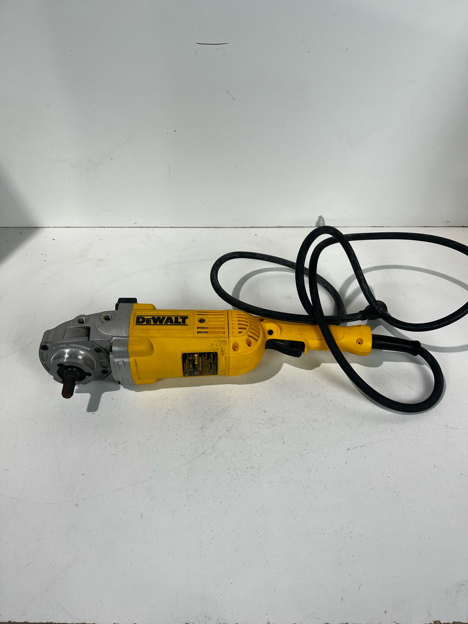 lot 124 image: Dewalt Heavy Duty Angle Grinder With Large Hole Saw, Two Corded Power Drills And Carrying Case