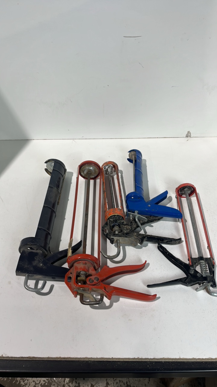 lot 180 image: Lot Of Caulking Guns In Various Sizes