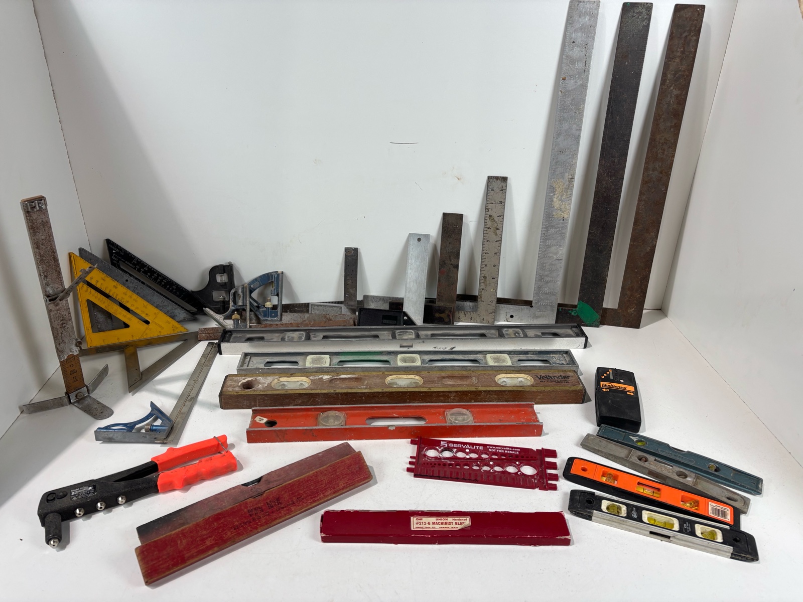 lot 275 image: Lot Of Speed Squares, Carpenter Squares, Levels and Tapes