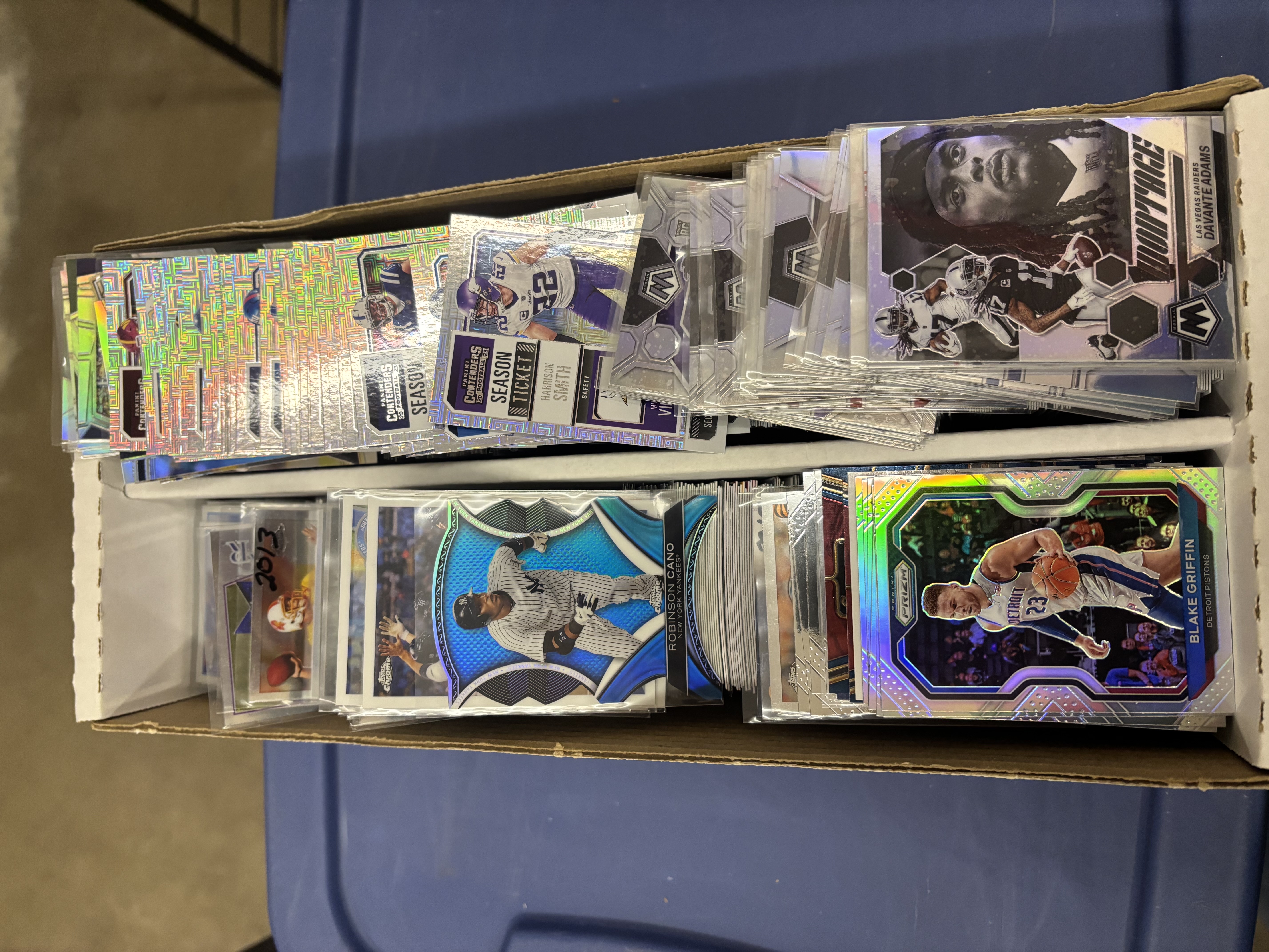 lot 105 image: Box of Shiny Sports Cards, Prizms, Refractors, Stars and More, Mix of Sports and Years