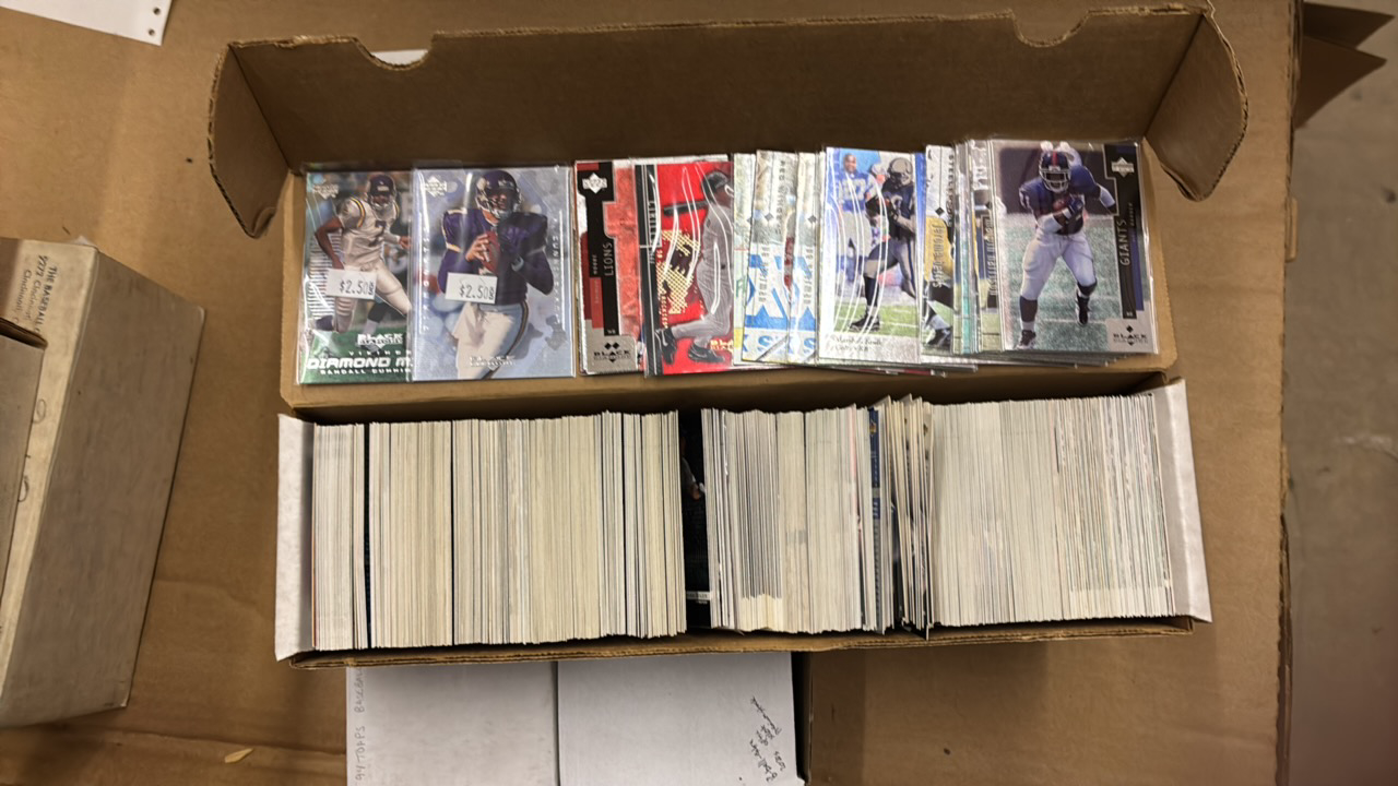lot 129 image: Box of Upper Deck Black Diamond Cards, Mostly Football, Very Few Baseball and Hockey, Lots of Star Cards in Sleeves