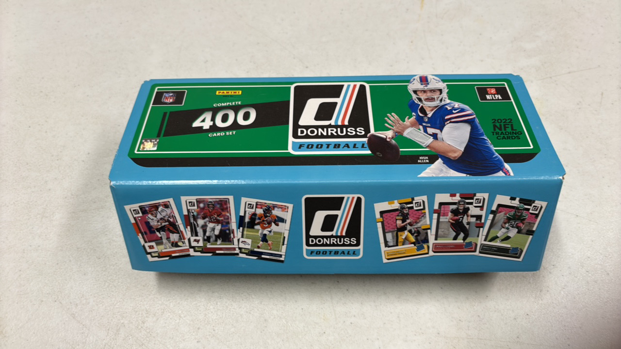 lot 159 image: 2022 Donruss Football Card Set, Likely Not a Complete Set, Rare Gold Press Proof Version Some Cards May be Missing