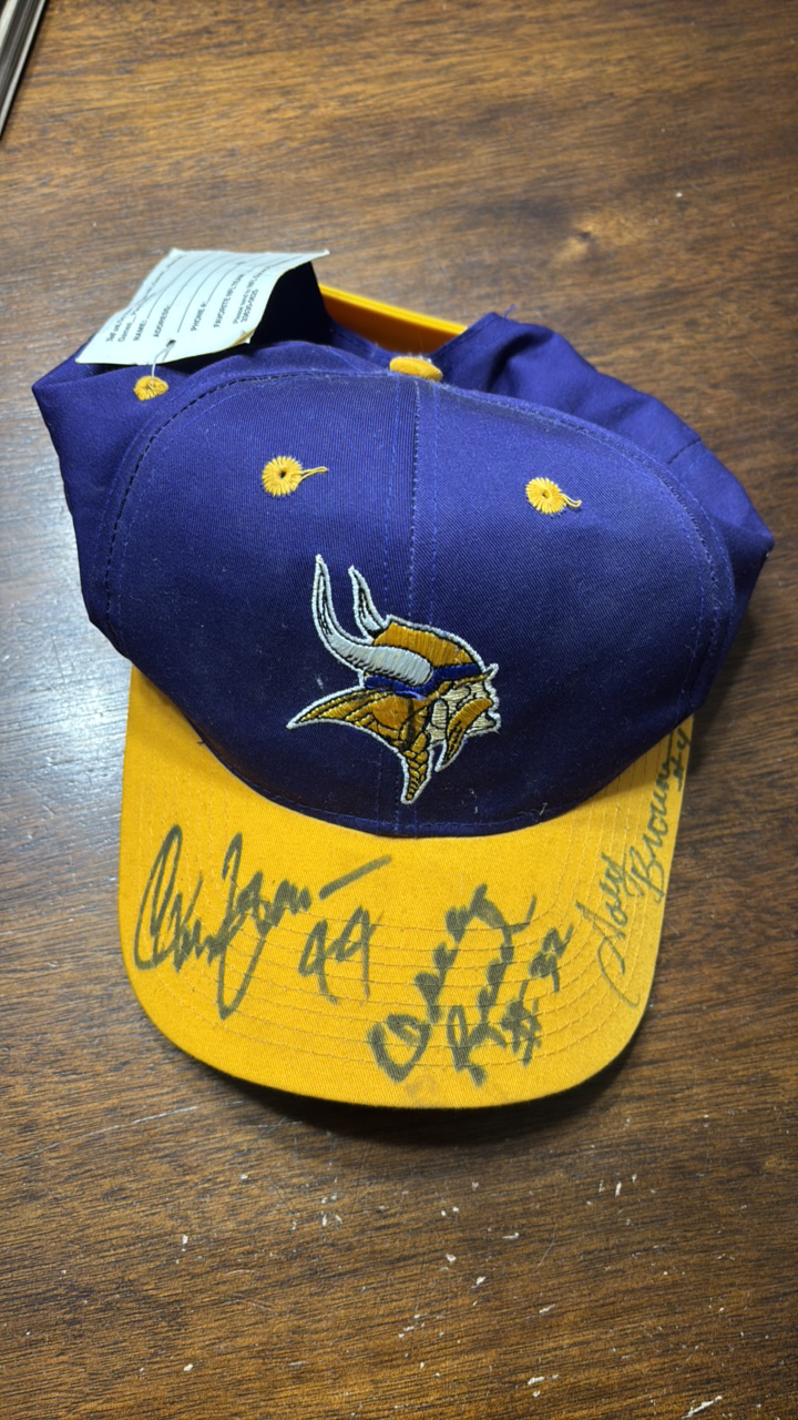 lot 269 image: Autographed Minnesota Vikings Hat, Three Unknown Autographs from Players, Tag Still Attached Nevr Worn