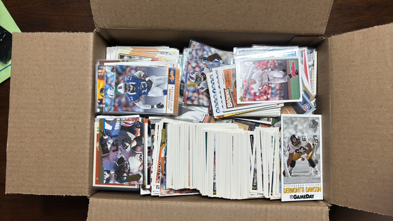 lot 278 image: Huge Box of Random Football, Basketball and Baseball Cards