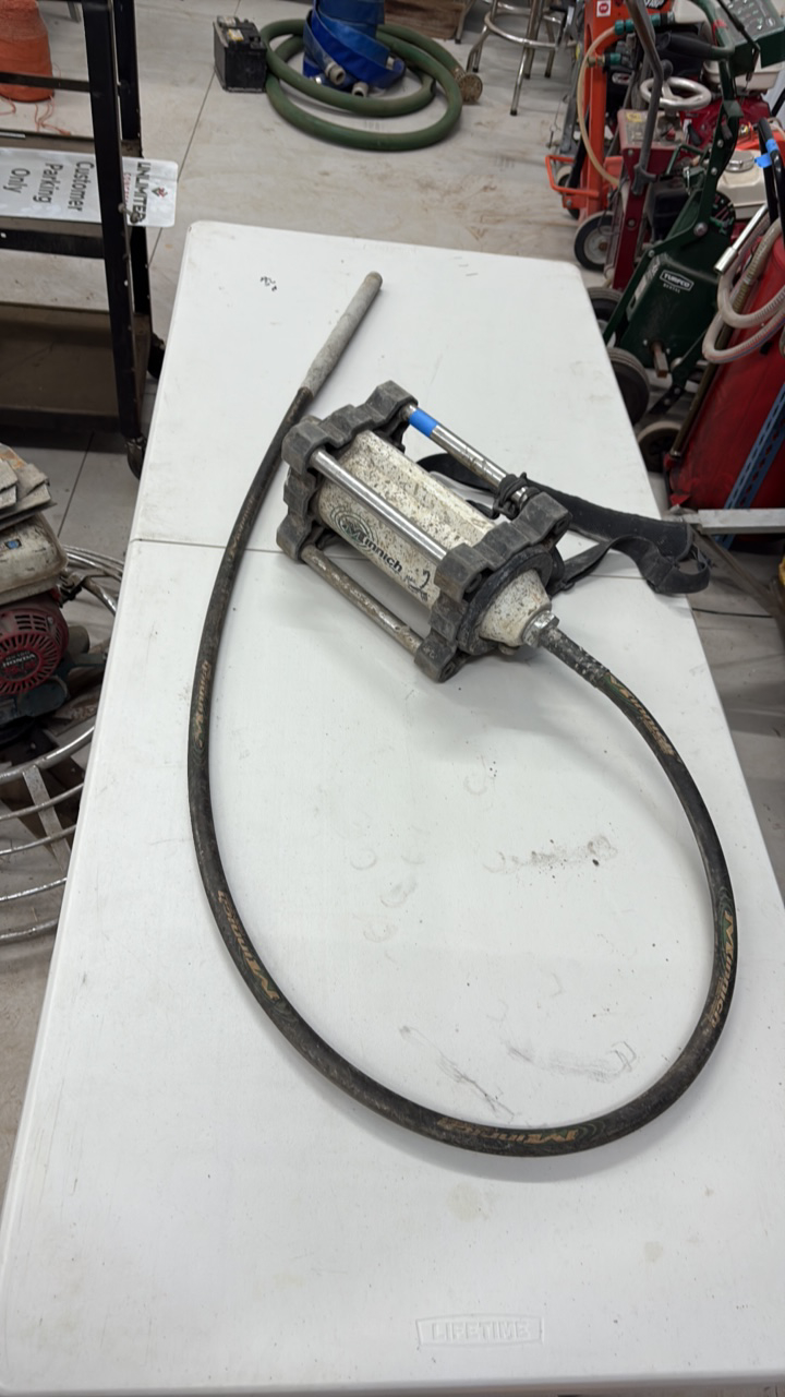 lot 10 image: Minnich Concrete Electric Vibrator with whip