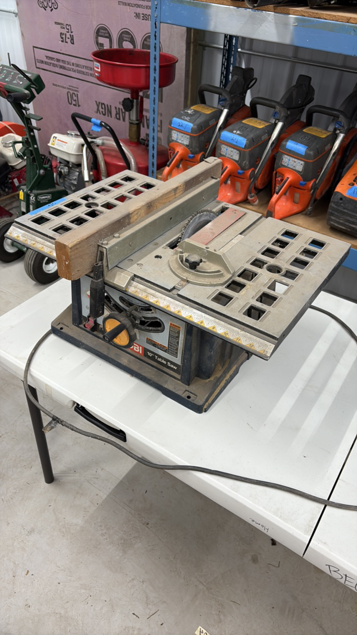 lot 32 image: Ryobi 10 inch table saw
