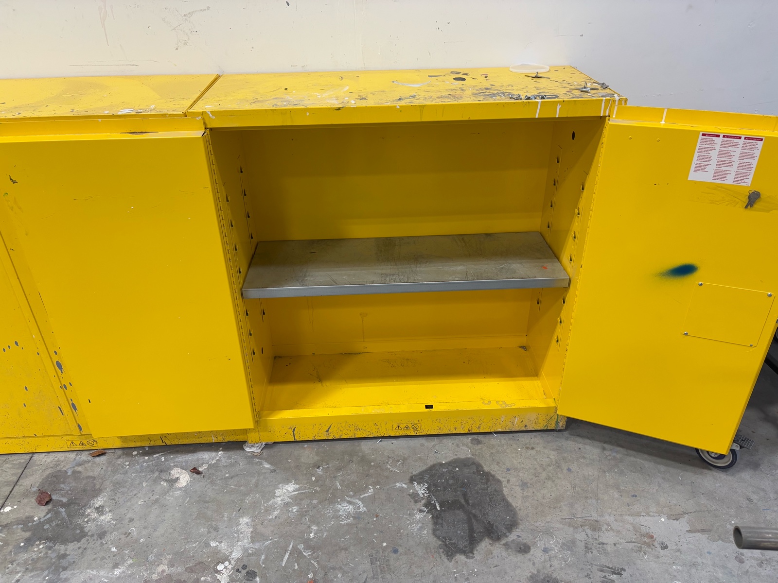 lot 48 image: ULine Flammable Liquid  Cabinet H-1563M-Y.