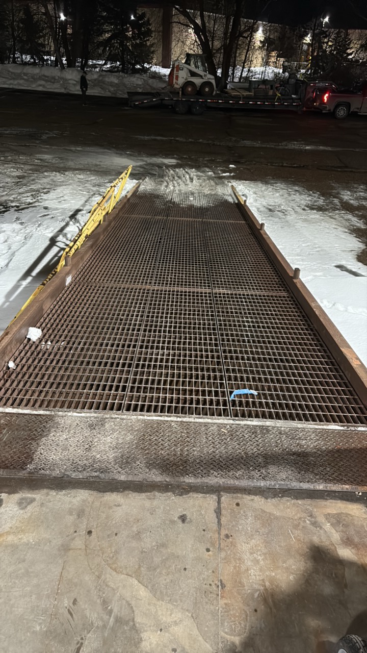 Dock loading ramp w serrated grating. 38’ L x 8’ W