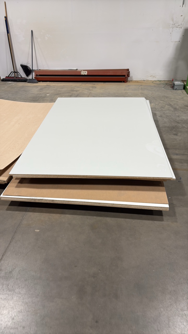 lot 67 image: Melamine-laminated particle board  8 x 5 34 and 10 x 5 34