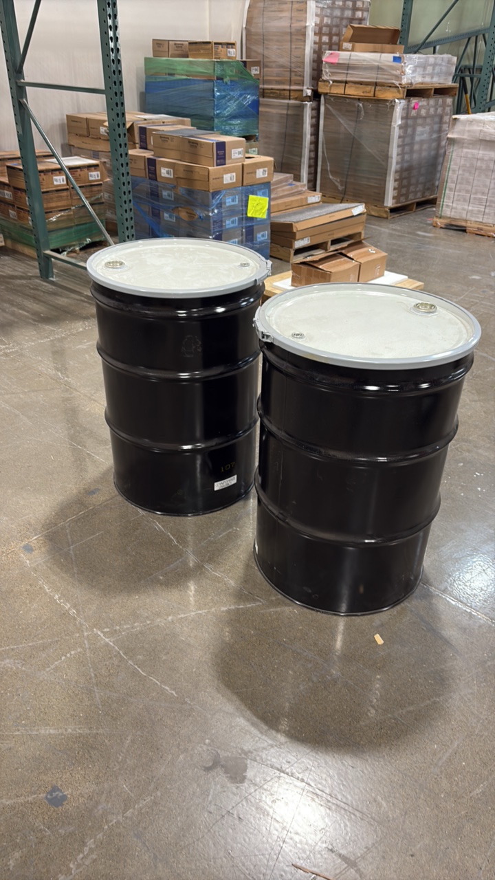 lot 81 image: (2) Uline Lined Lever-Lock Steel 55-gallon drums