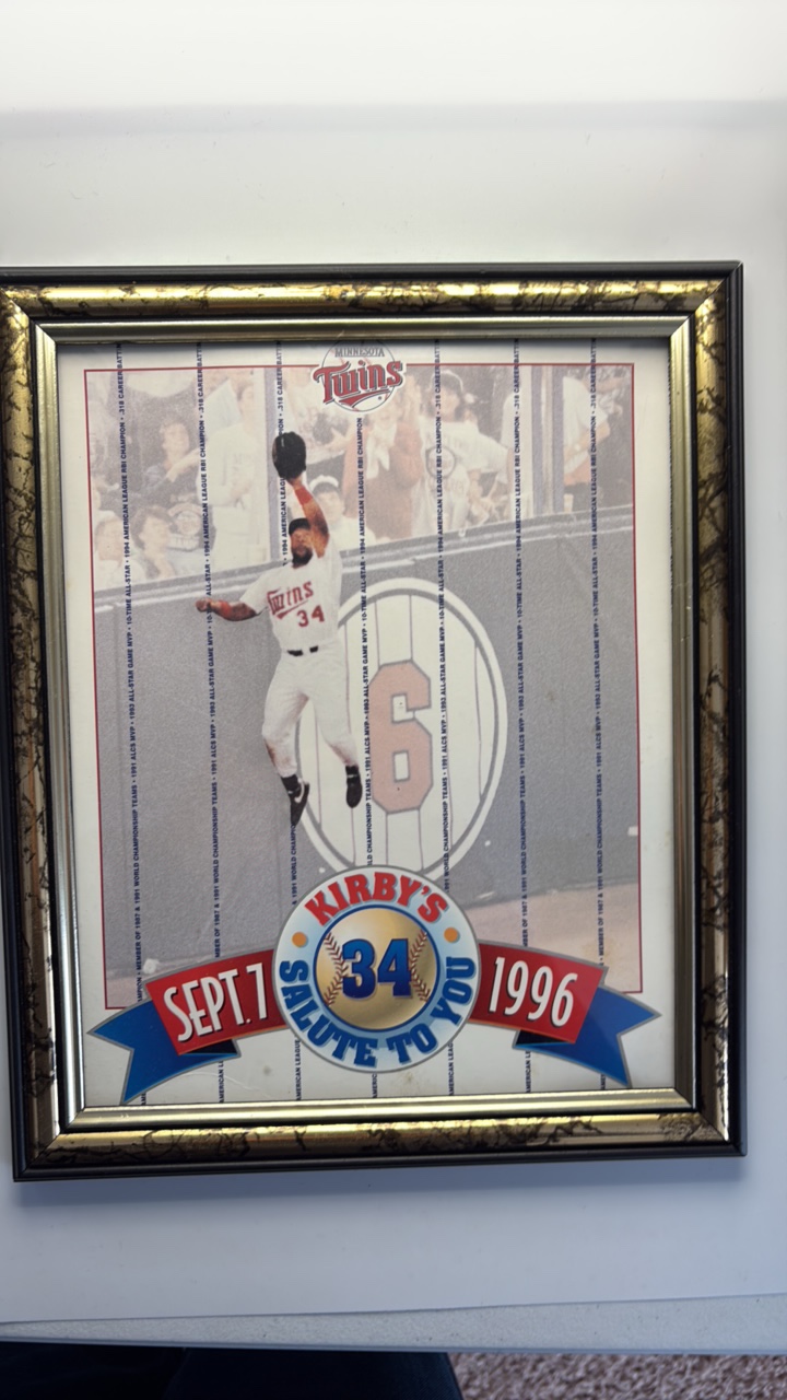 lot 109 image: Framed Kirby Puckett Team Commemorative Photo, Salute to #34 September 7th 1996