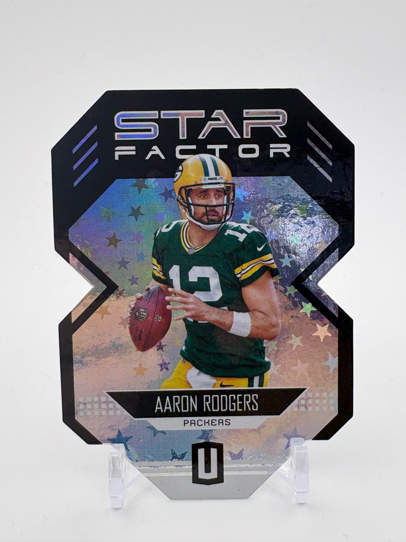 lot 179 image: 2018 Panini Unparalleled Star Factor Aaron Rodgers Insert Card Serial #d 033200 Green Bay Packers