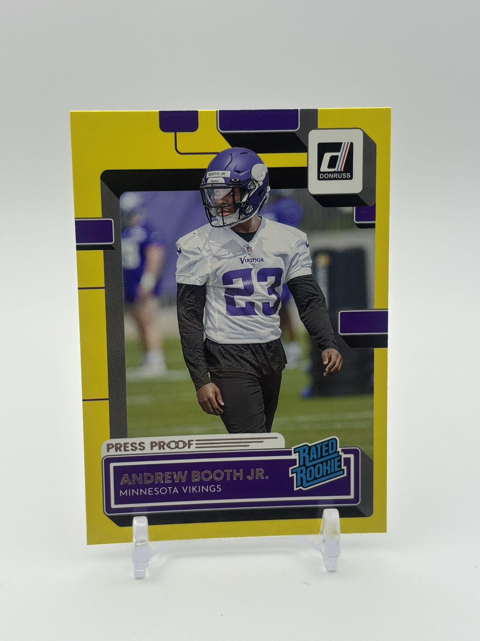lot 547 image: 2022 Panini Donruss - Rated Rookie Andrew Booth Jr. #369 Press Proof Yellow Rookie Card Minnesota Vikings