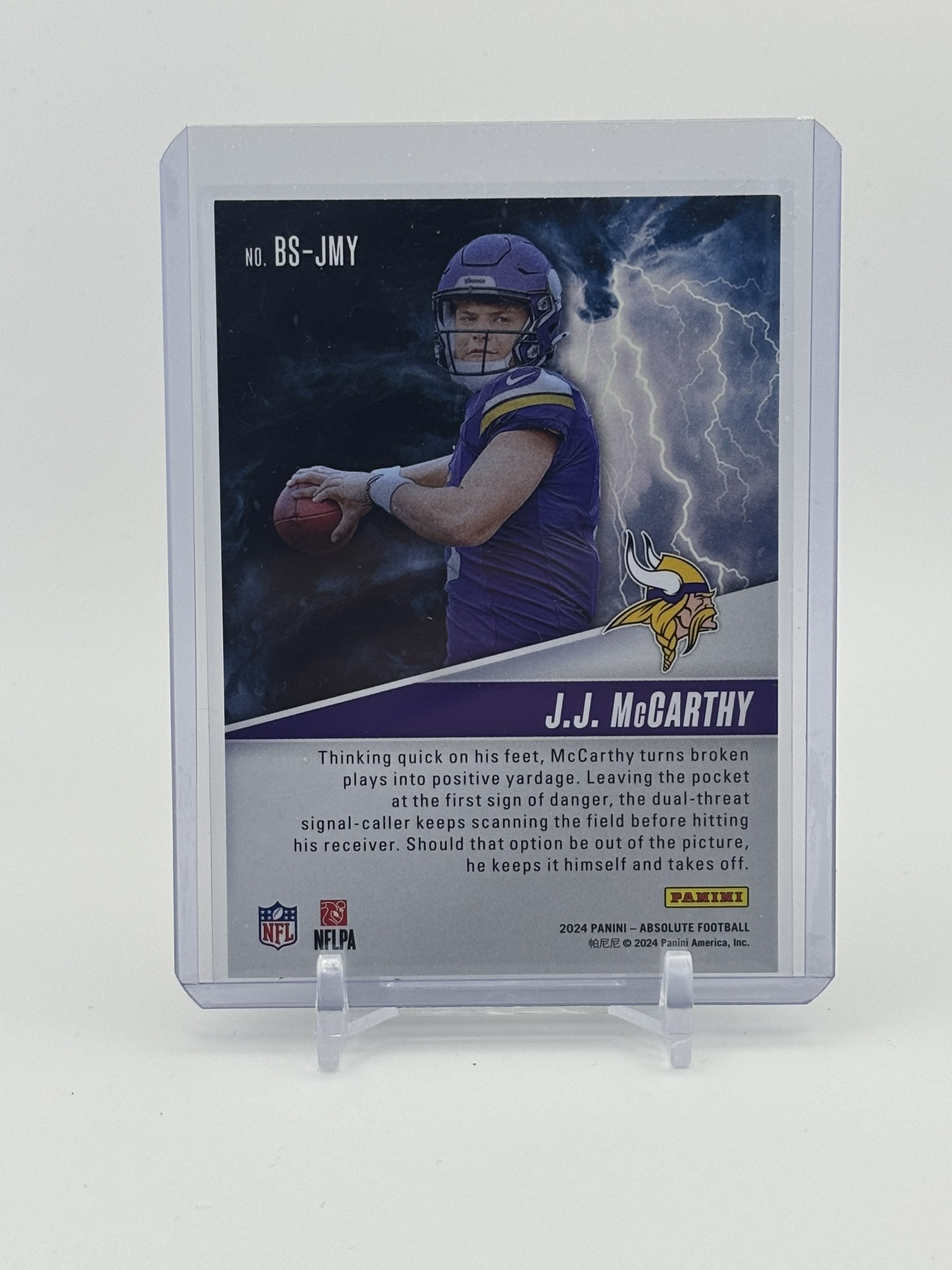 lot 574 image: 2024 Panini Absolute - By Storm J.J. McCarthy Rookie Card Minnesota Vikings