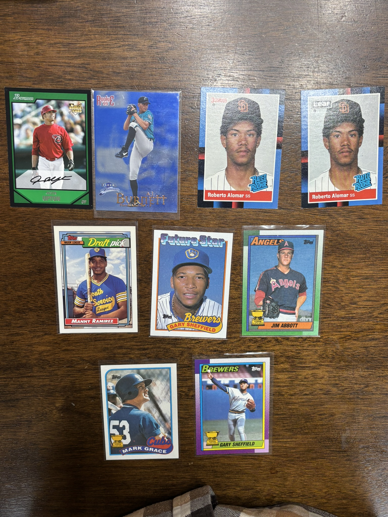 lot 614 image: Baseball Card Rookie Card Lot, 10-Cards all Rookies, Justin Upton, AJ Burnett, Roberto Alomar, Manny Ramirez, Gary Sheffield, Jim Abbot, Mark Grace