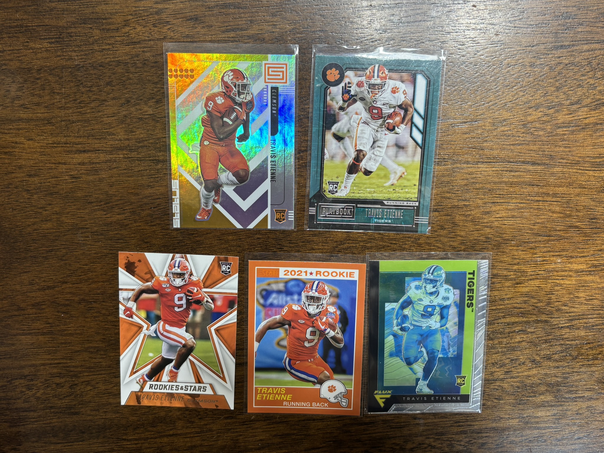 lot 618 image: Travis Etienne Rookie Card Lot, Five Different Rookie Cards NFL