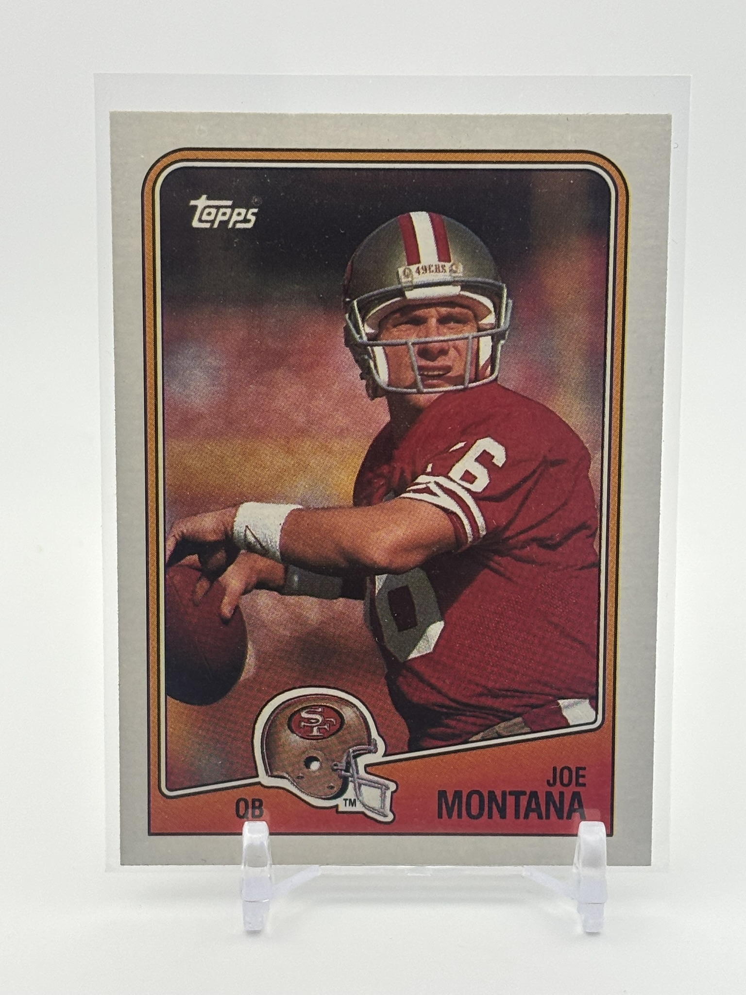 lot 704 image: 1988 Topps - Joe Montana #38 NFL Legend Hall of Famer