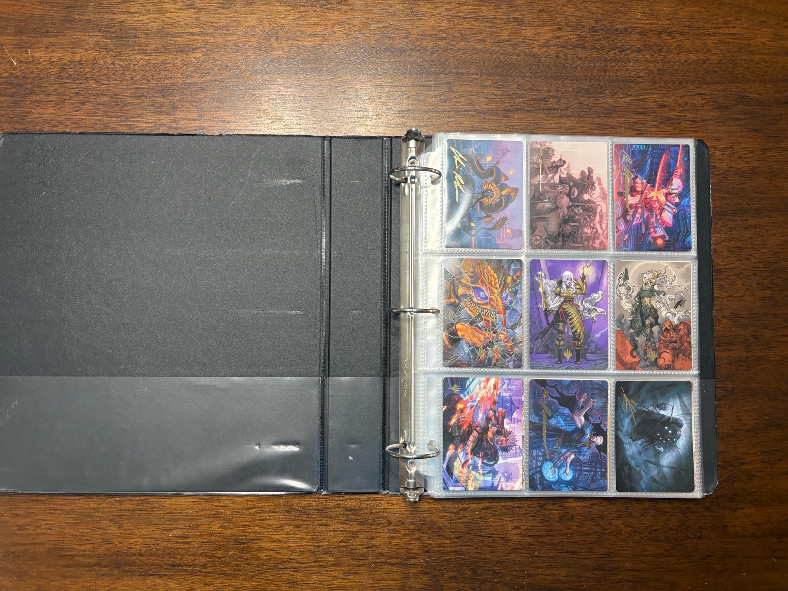 lot 101 image: Binder of Magic the Gathering Art Series Cards, Some Gold Artist Versions Included, RARE Variations
