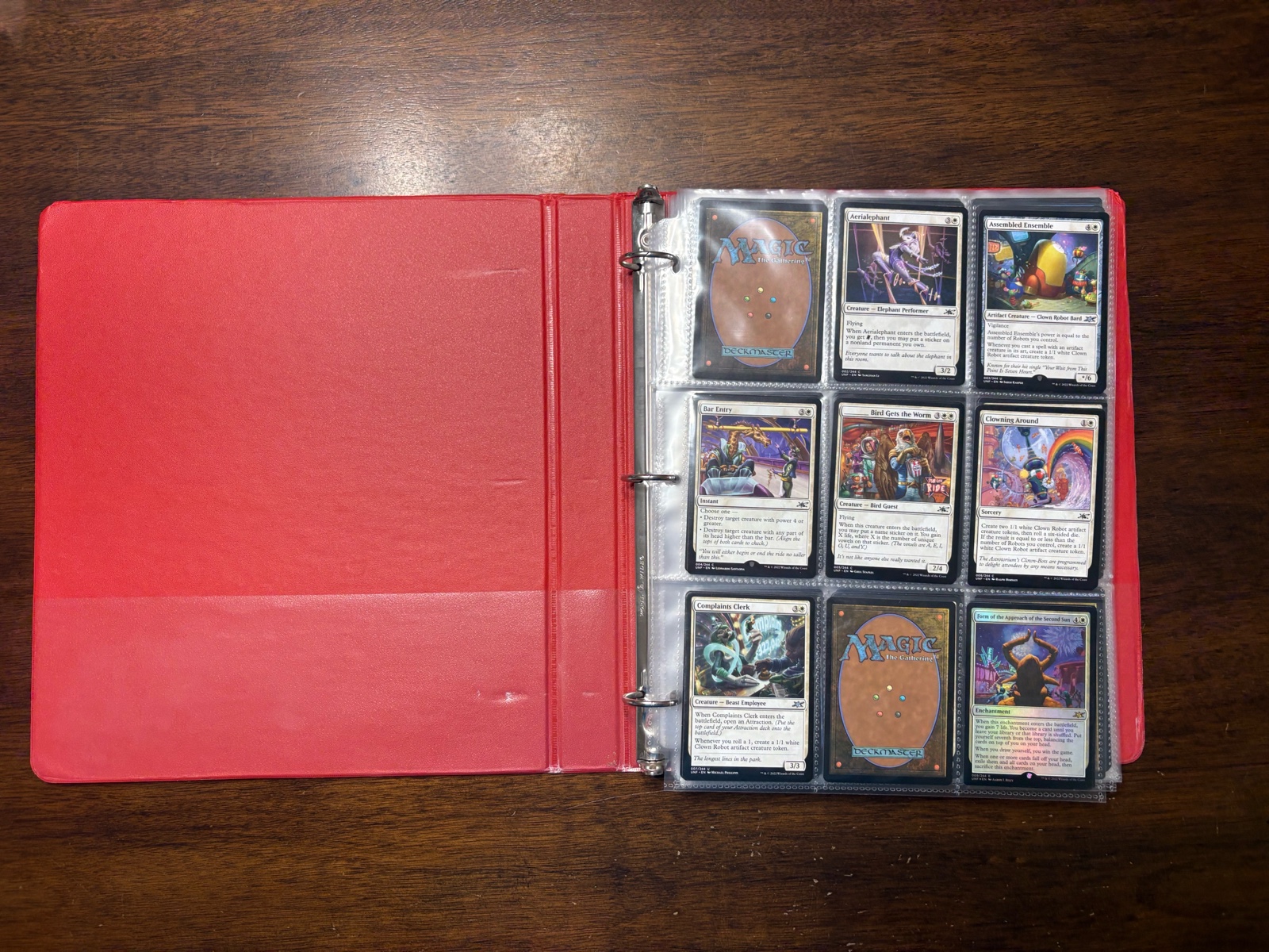 lot 102 image: Binder of Magic the Gathering Unfinity Cards Includes Full Art Land Cards