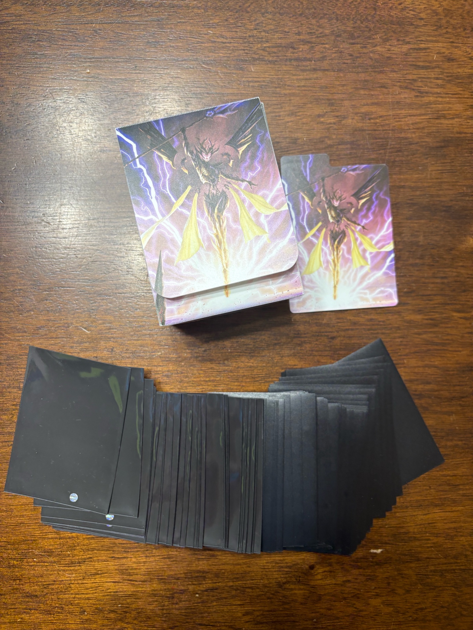 lot 132A image: Rare Magic the Gathering Tournament Deck Box and Sleeves, Only Given to Players Who Competed in Official Tournament in Madison Wisconsin