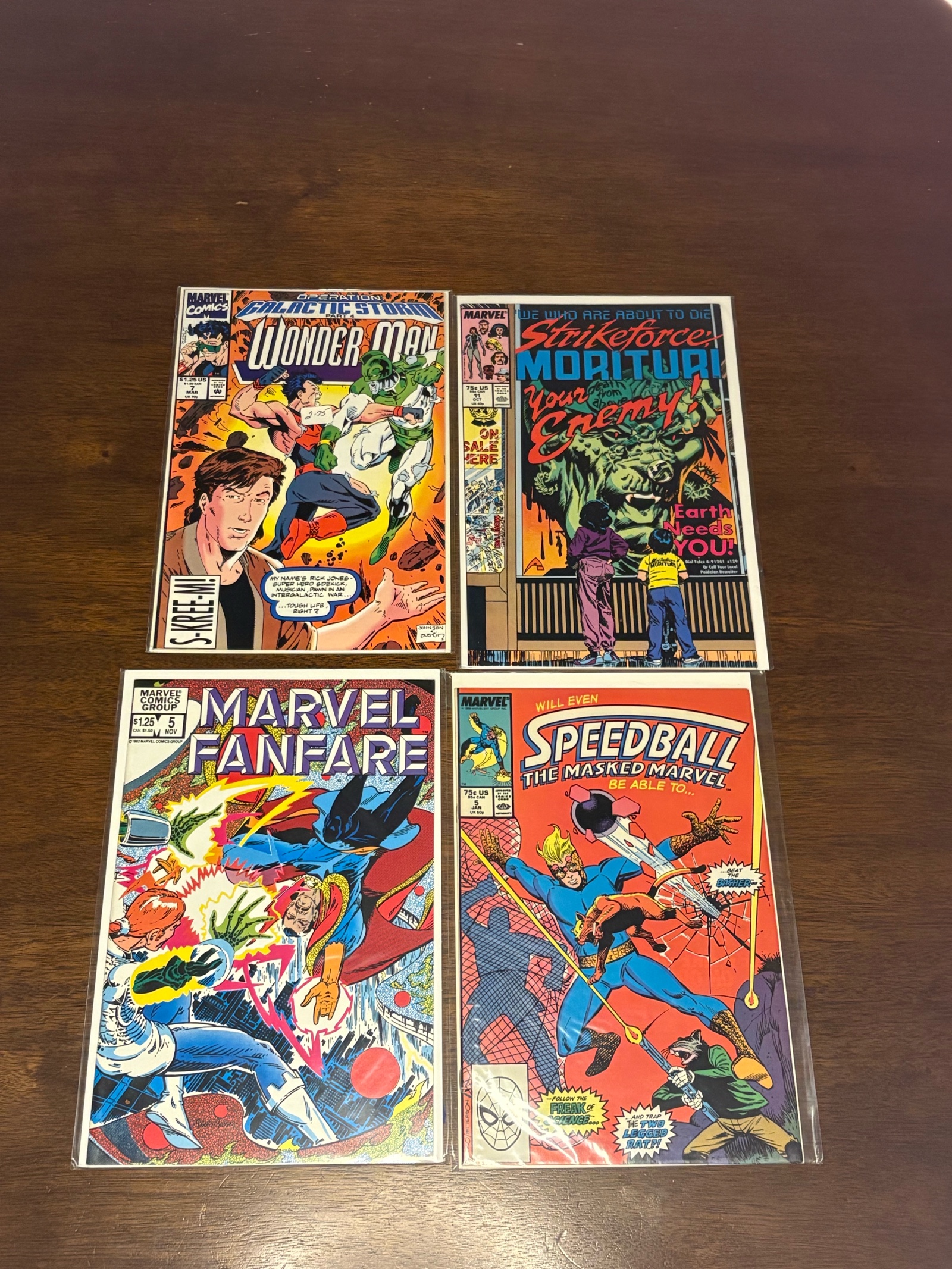 lot 338A image: Marvel Comic Book Lot, Mix of Heroes, 4 Comic Books
