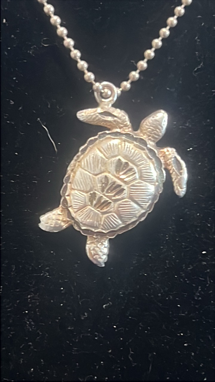 lot 102 image: Sterling silver turtle pendant