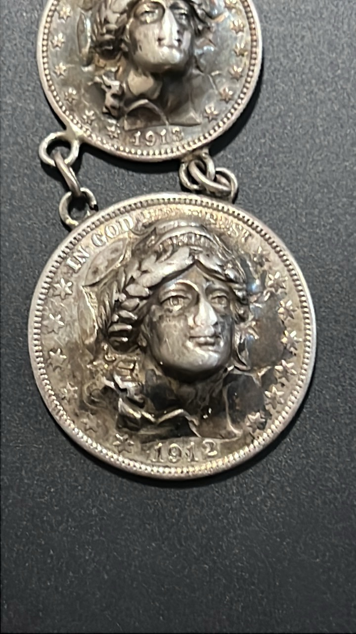 90% silver pendant made of a barber dime, quarter, and half dollar