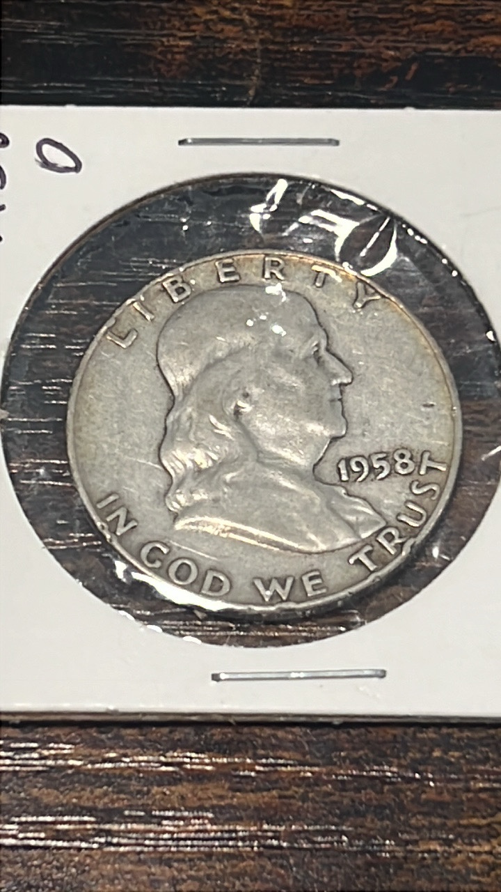 lot 23 image: 1958 d Benjamin Franklin half dollar