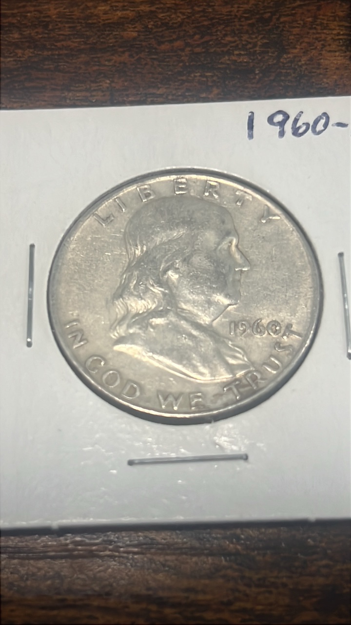 lot 27 image: 1960 d Benjamin Franklin half dollar