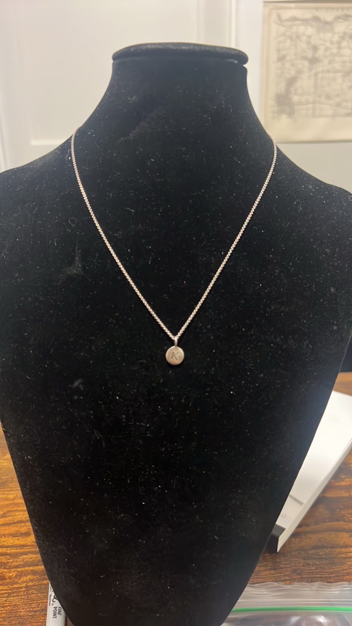 lot 90 image: sterling silver K charm and necklace