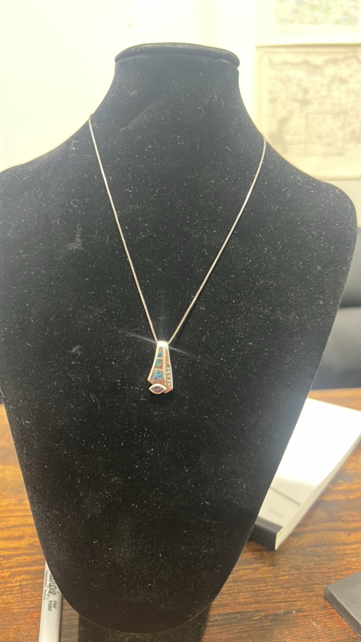 lot 91 image: Sterling silver fire opal, diamond, and amethyst pendant and chain,