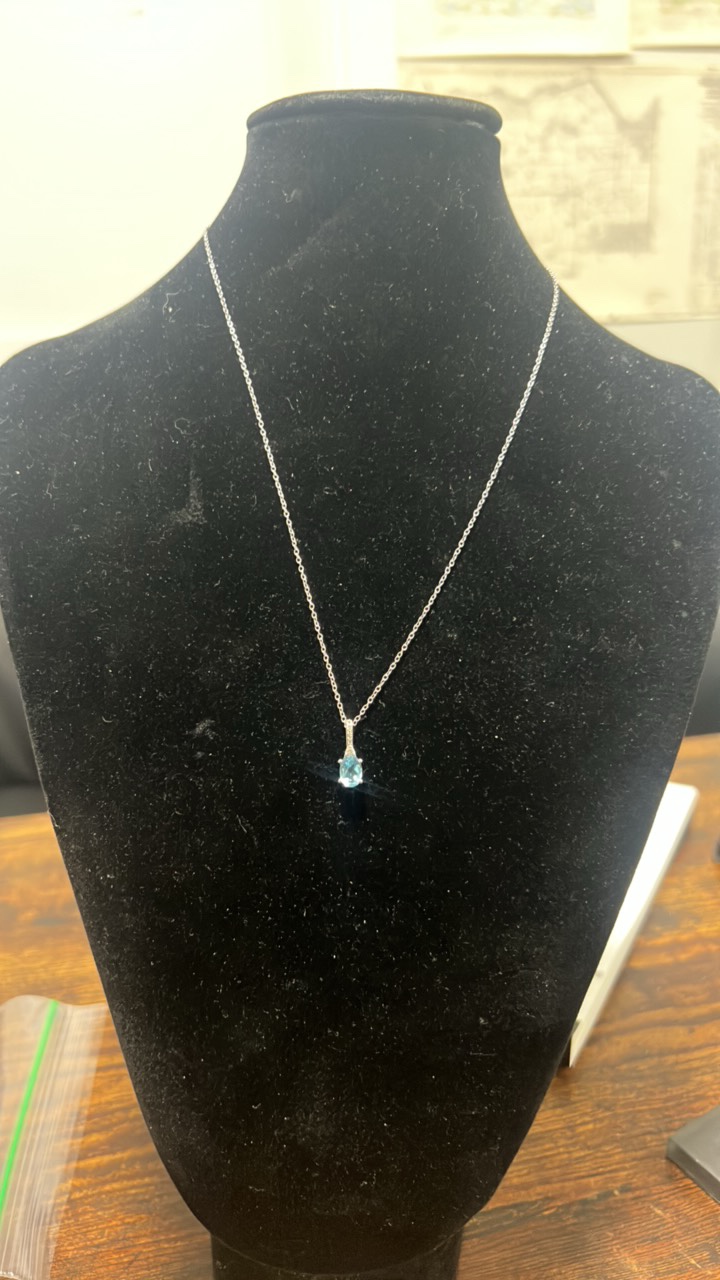 lot 93 image: Sterling silver pendant and chain