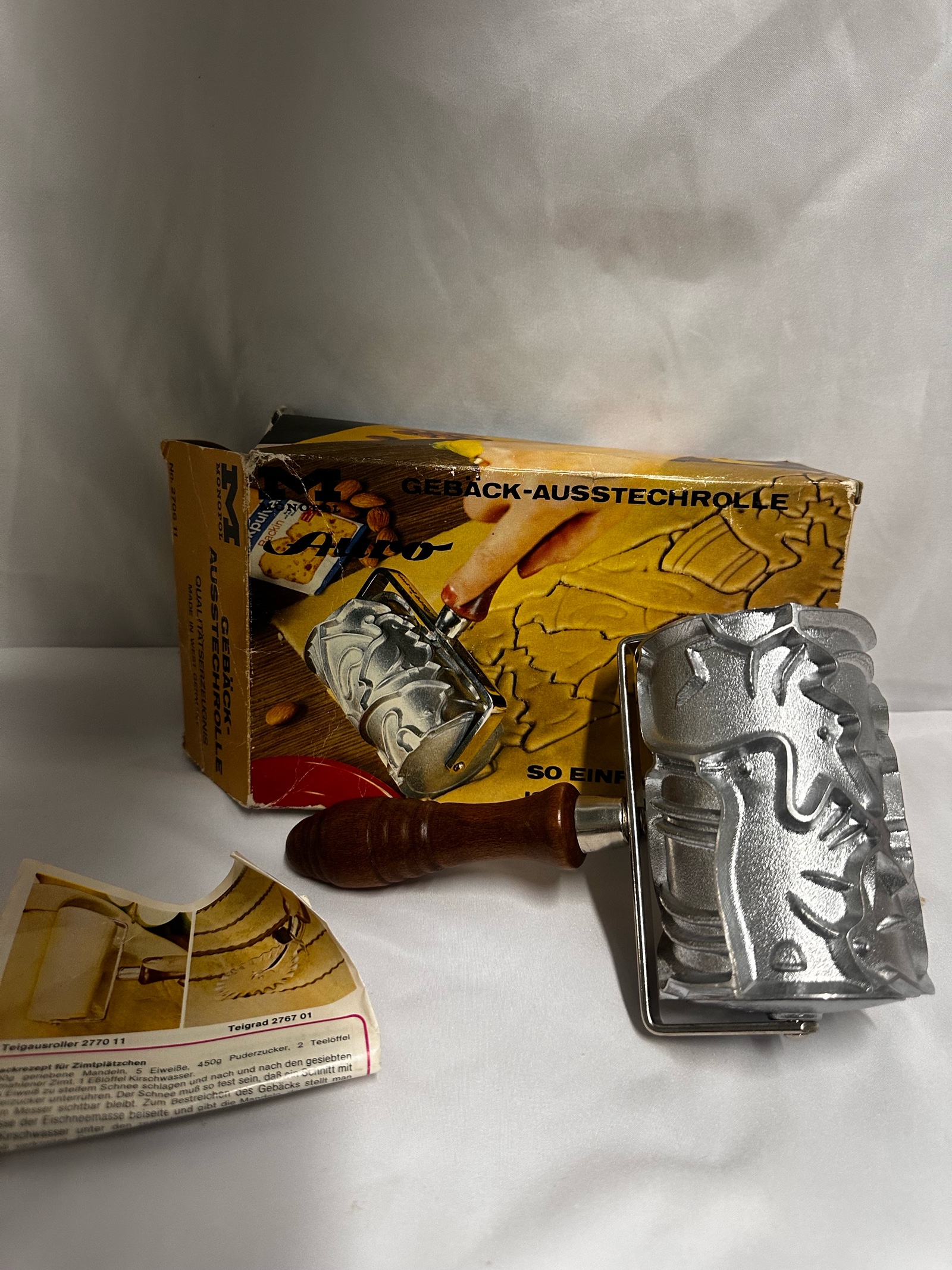 vintage German Monopol Auro metal pastry roller cookie cutter