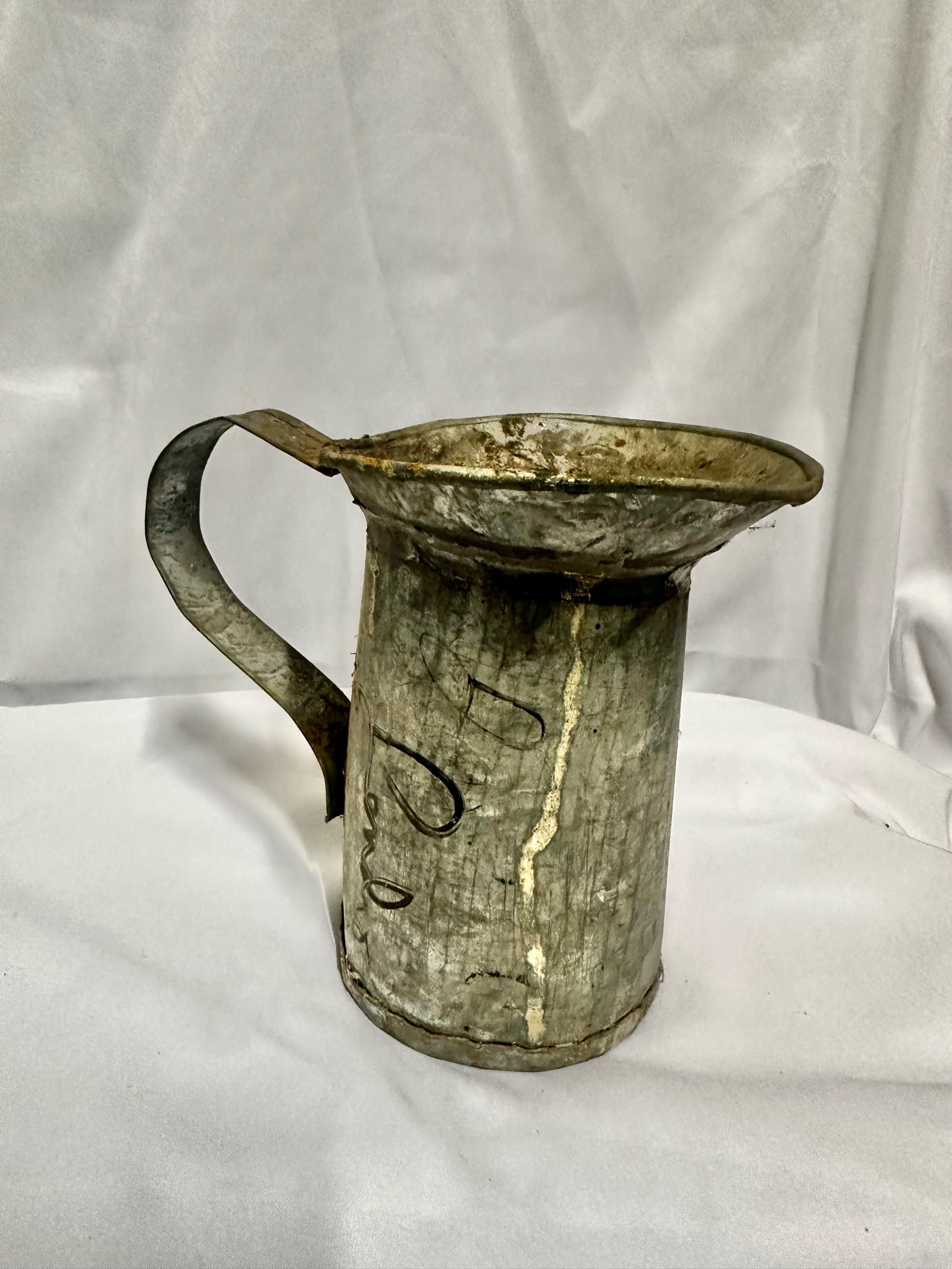 Vintage McClary galvanized metal quart measuring pitcher.